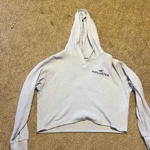 long sleeve cropped hollister sweater in the color lavender